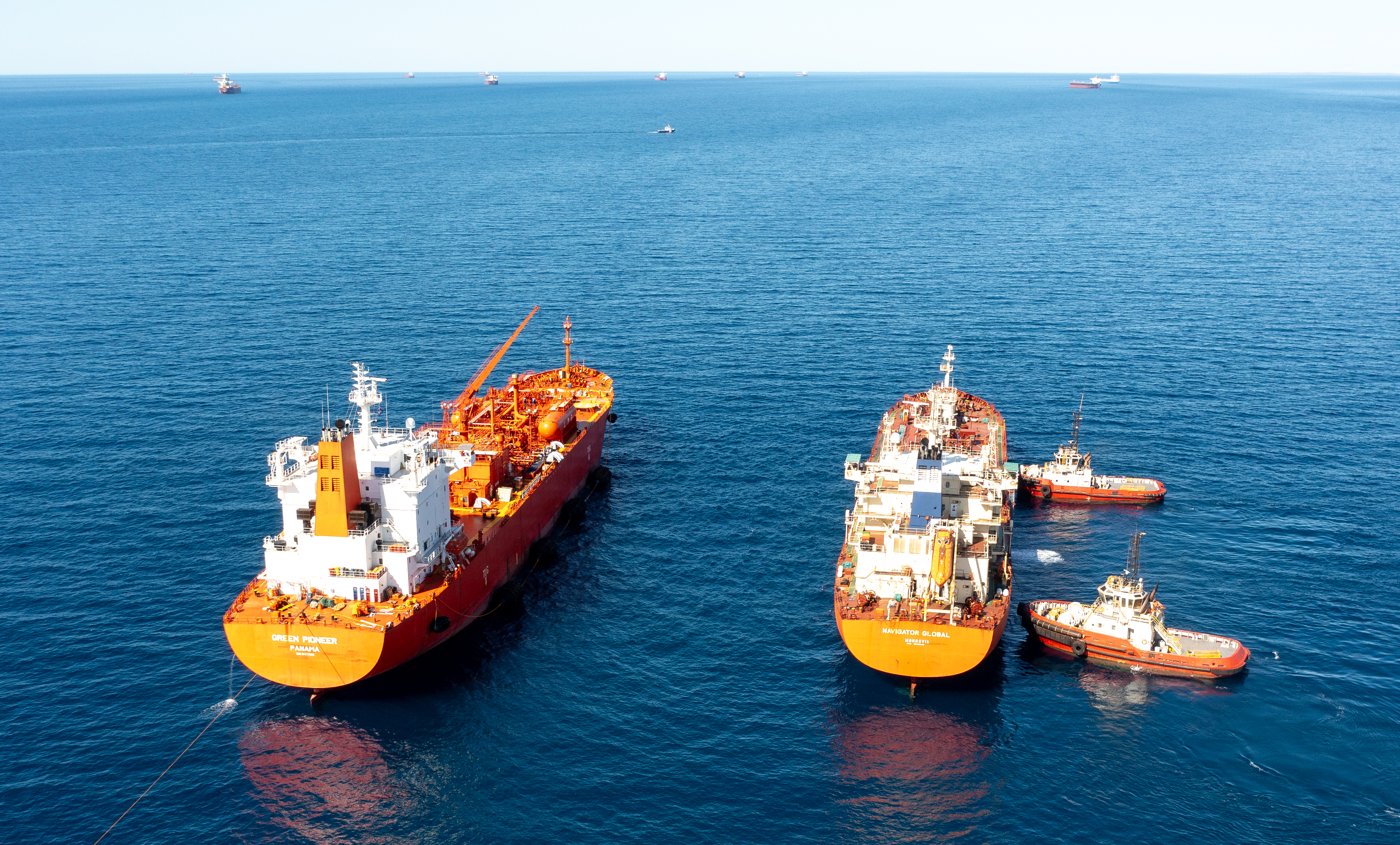 Pilbara The Green Pioneer and the Navigator Global with Rio Tinto tugboats at the outer anchorage of Port Dampier-1.jpg